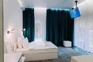 Отель Гостевия. Улучшенный двухместный Стандарт с большой террасой 3-й корпус 4